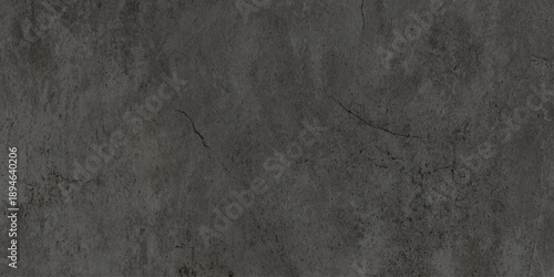 A high contrast moody abstract wall background featuring a dark grey stone surface vignetted edges and atmospheric lighting make it ideal for cinematic posters.
