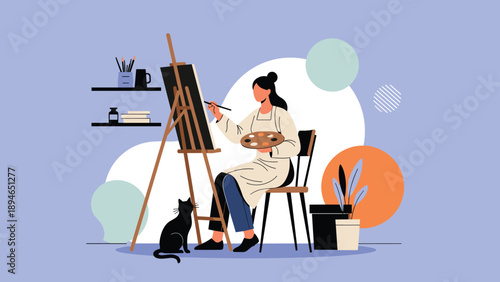 Talented female artist painting on a large canvas while sitting in her creative studio with a black cat resting on the floor beside her.