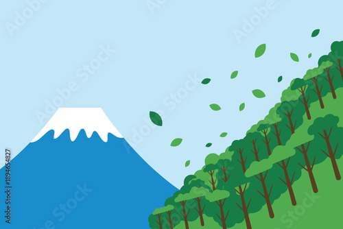 Mountain with snow and trees on green hill with leaves flying in the air