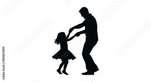 A tender moment captured as a father and daughter share a joyful dance presented as a silhouette