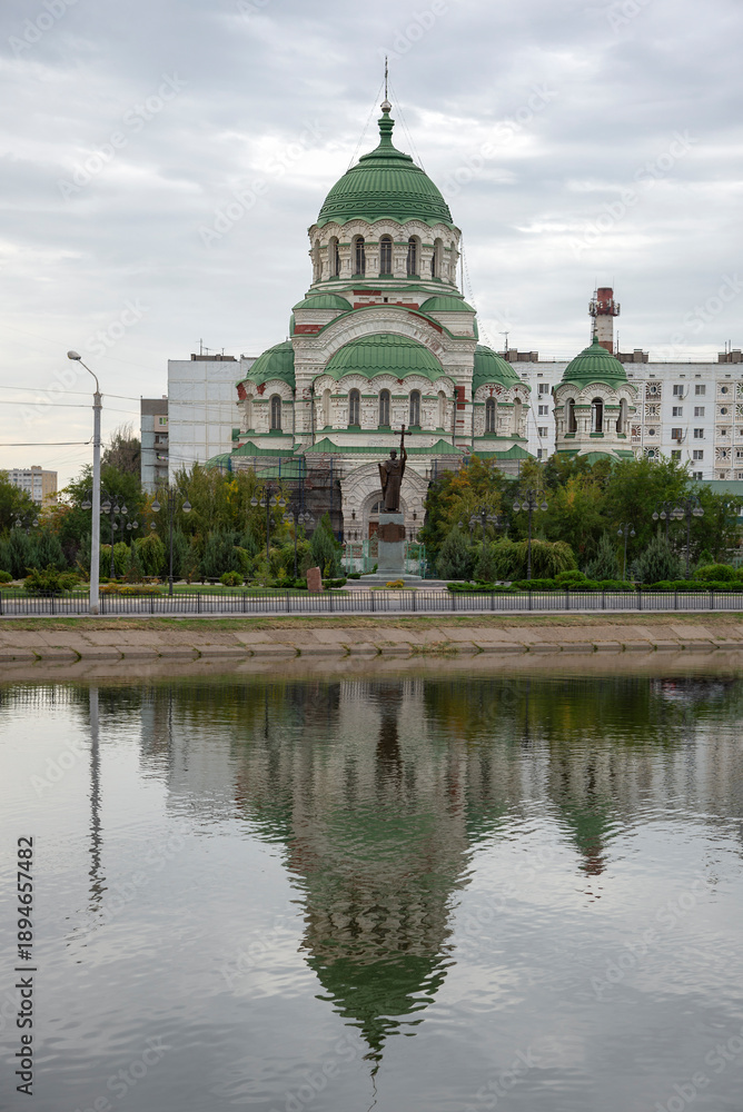 Fototapeta premium View on Vladimir Cathedral with reflection. Astrakhan
