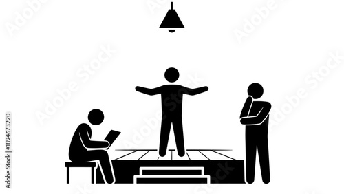 Director coaching actor on stage with audience member watching.