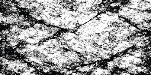 A rough gray stone wall texture with a cracked marble surface and old grunge cement patterns reveals a dirty weathered rock material in this nature-inspired closeup background