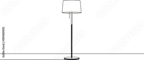 Modern floor lamp providing warm lighting in a simple room