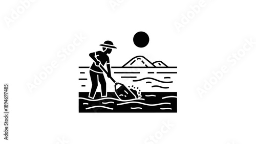 Fisherman casting a net in the ocean during sunset.