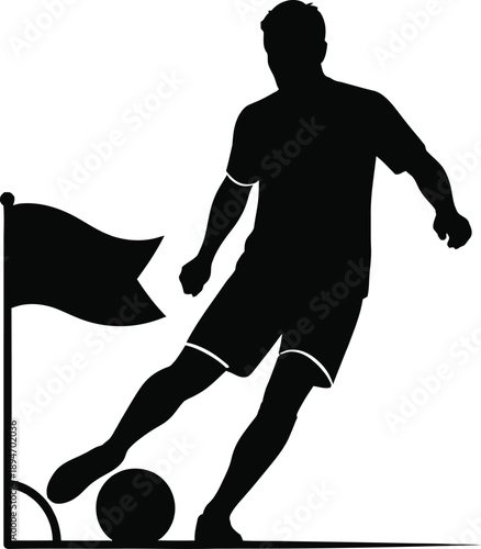 Silhouette of a soccer player kicking a ball near a corner flag