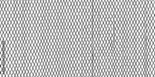 Close up of a woven texture with a vertical dividing line