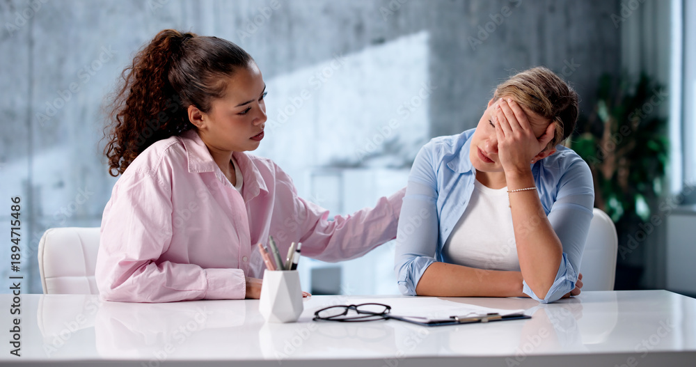 Fototapeta premium Office Team Supports Sad Businesswoman Under Work Stress