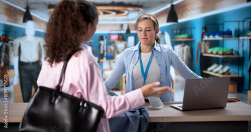 Upset Fashion Store Customer Arguing With Manager Over Returned Clothes
