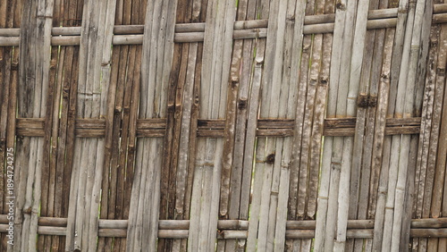 old cement wall background, and dark brown woven bamboo background