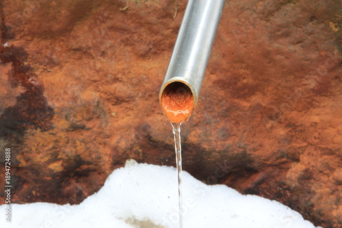 Vivid red texture of the water, reach with iron.