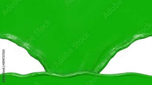 Green liquid pouring against white background abstract visual concept