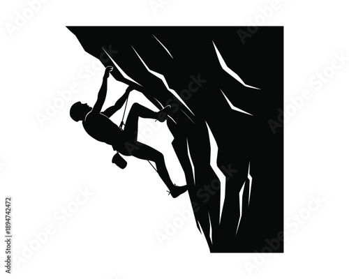 man climbing a steep rock face in silhouette