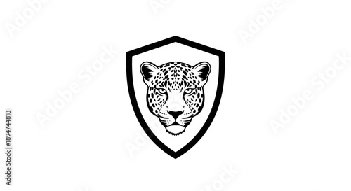 Black and white illustration of a leopard's head in a shield on a white background.