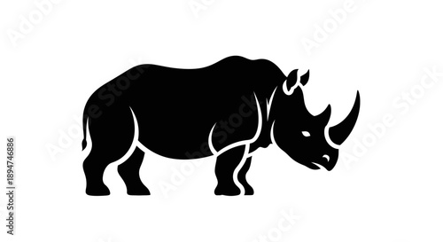 Black silhouette of a rhinoceros against a white background.
