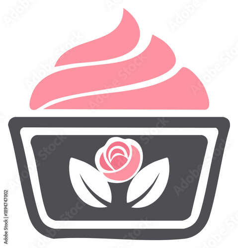 Pink frosting cupcake with rose and leaf decoration in dark grey wrapper