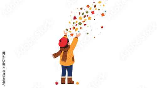 Young child in a yellow jacket and red hat throwing colorful autumn leaves up into the air and watching them fall.