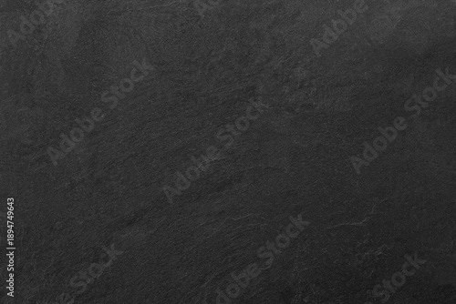 Dark grey black slate background or texture.