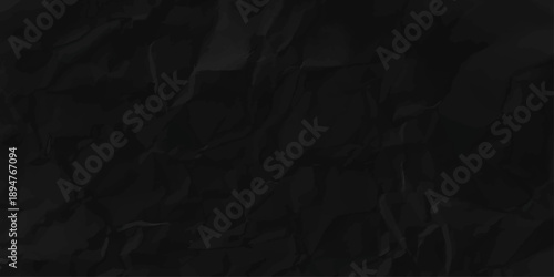 Black crumpled paper texture with folds, black background, black paper texture. crumpled torn and old black paper