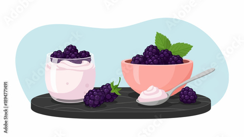 Fresh blackberries with creamy yogurt and mint leaves on a dark board