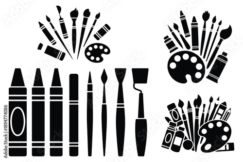 Black supplies collection with crayons paintbrushes and palettes