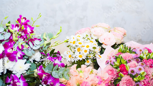 a bouquet of flowers on a gray background