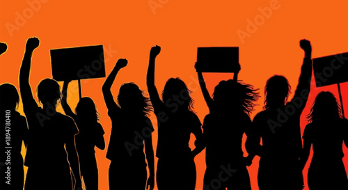 Protestors Silhouetted Against Orange Sky Holding Signs.