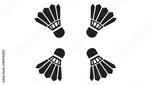 Four black shuttlecocks arranged in a square on a white background