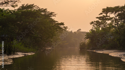 Scenic rural, landscape view at sunset of river on the outskirts of Barisal or Barishal, Bangladesh