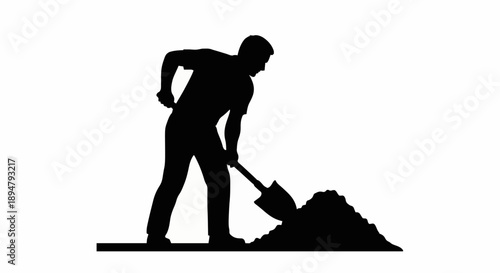 Silhouette of a construction worker digging soil with a shovel.