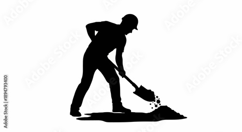 Silhouette of a construction worker digging with a shovel.