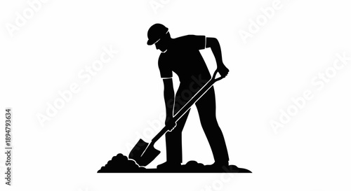 Silhouette of a construction worker digging with a shovel.
