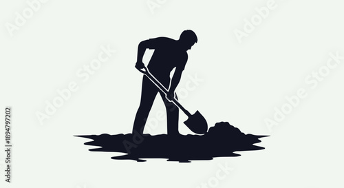 Silhouette of a man digging with a shovel.