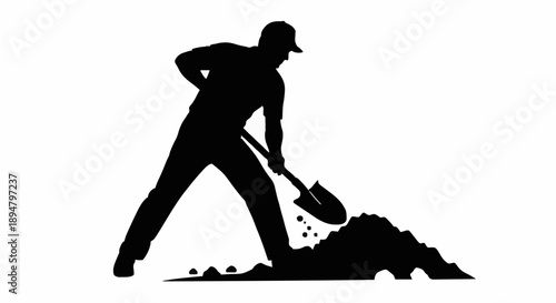 Silhouette of a construction worker digging with a shovel.