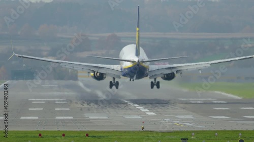 Commercial aircraft approaches runway for landing at international airport