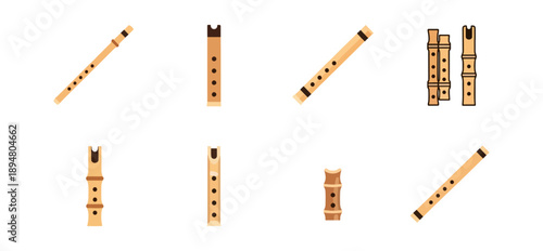 Collection of wooden flutes isolated on black background