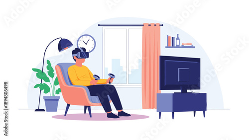 Young man sitting in an armchair while wearing a virtual reality headset and holding controllers to play immersive games at home.