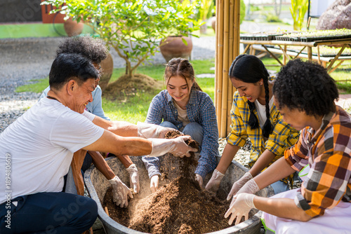 The students are learning about soil and how to prepare it for planting trees.