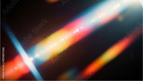 Vibrant streaks of light illuminating darkness from abstract perspective