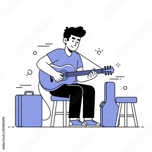 Young male playing acoustic guitar outdoors with luggage nearby