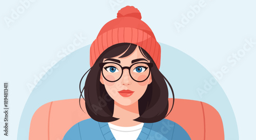 A stylish woman with glasses and a knitted hat relaxes on a couch