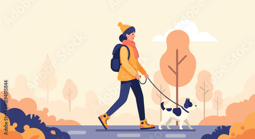 A person in warm clothing walks a dog through a park in autumn