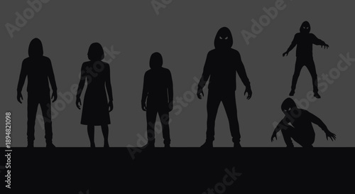 Group of people silhouetted against a dark background with one person crouching and another jumping.