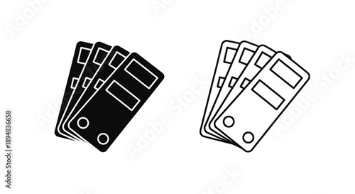 Two stacks of credit cards presented in a stark black silhouette