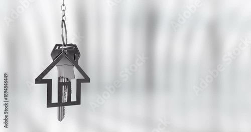 House-shaped keychain and keys animation over blurred background