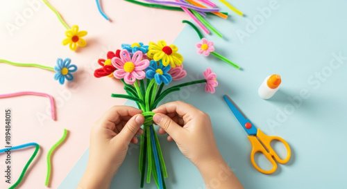 Educational Kids Craft Showing Child Hands Making Pipe Cleaner Flower on Soft Pastel Background