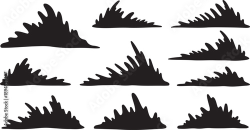 Collection of black mountain silhouettes on white background