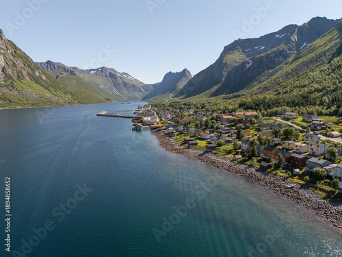 14 july 2025, Gryllefjord, Norway. Aerial, drone view of Gryllefjord on Senja island. Charming fishing village near the water, mountains in background. Beautiful travel destination in nordic Norway. F