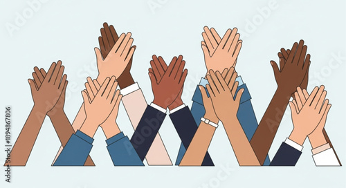 Diverse group of people clapping hands together in celebration.