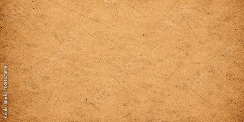 A vintage brown parchment background with an aged, grunge texture features a blank, antique paper surface and rough, yellowed cardboard material for a retro design
